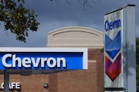 FILE PHOTO: A Chevron gas station sign is seen in Austin, Texas, U.S., October 23, 2023.   REUTERS/Brian Snyder/File Photo