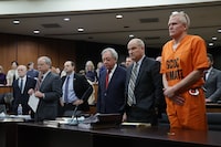 Alex Murdaugh, convicted of killing his wife, Maggie, and younger son, Paul, in June 2021, stands with his defense team during a hearing on a motion for a retrial, Jan. 16, 2024, at the Richland County Judicial Center in Columbia, S.C. Murdaugh is scheduled to be sentenced Monday, April 1, 2024 on financial crime charges. It's likely the last time he will face a judge for punishment. (Tracy Glantz/The State via AP, Pool)