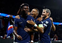 Soccer Football - Euro 2024 Qualifier - Group B - France v Republic of Ireland - Parc des Princes, Paris, France - September 7, 2023 France's Aurelien Tchouameni celebrates scoring their first goal with Kylian Mbappe and Theo Hernandez REUTERS/Sarah Meyssonnier     TPX IMAGES OF THE DAY