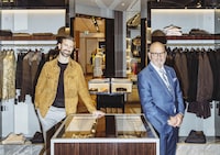 Chairman and CEO Larry Rosen (blue suit), and president and COO Ian Rosen photographed at their flagship Harry Rosen store in Toronto on Wednesday March 13, 2024. 
(Carlos Osorio/The Globe and Mail) 