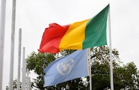 A UN flag and Mali flag fly on the MINUSMA Main Operations Base in Bamako, Mali, Africa on Saturday, June 23, 2018. THE CANADIAN PRESS/Sean Kilpatrick
