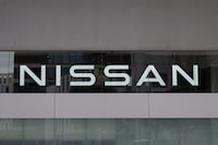 The logo of Japanese automaker Nissan Motor is seen at the company's head office in Yokohama on May 9, 2024. (Photo by Yuichi YAMAZAKI / AFP) (Photo by YUICHI YAMAZAKI/AFP via Getty Images)