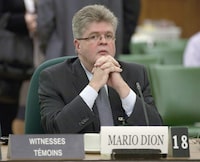 Mario Dion waits to appear before the Commons estimates committee on Parliament Hill in Ottawa, Tuesday December 13, 2011.&nbsp;It's been six months since the federal government has had a permanent ethics commissioner, making it the only jurisdiction in Canada operating without a conflict-of-interest watchdog who can conduct investigations. THE CANADIAN PRESS/Adrian Wyld