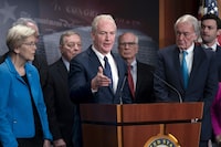 Sen. Chris Van Hollen, D-Md., center, is joined by fellow Democrats as they discuss a national security memorandum with the Biden administration aimed at ensuring all weapons acquired through U.S. security assistance is used in line with international law, including international humanitarian law, at the Capitol in Washington, Friday, Feb. 9, 2024. Van Hollen is joined by, from left, Sen. Elizabeth Warren, D-Mass., Sen. Dick Durbin, D-Ill., Sen. Peter Welch, D-Vt., Sen. Ed Markey, D-Mass., and Sen. Jon Ossoff, D-Ga. (AP Photo/J. Scott Applewhite)