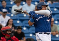 Toronto Blue Jays designated hitter Daniel Vogelbach puts a ball in play during Spring Training action against the Boston Red Sox on Friday, March 22, 2024, in Dunedin, Fla. THE CANADIAN PRESS/Mark Taylor
