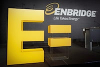 Enbridge's logos are on display at the company's annual meeting in Calgary on May 12, 2016. THE CANADIAN PRESS/Jeff McIntosh