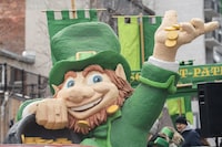 Many will don their green outfits with clover-green hats and head out to celebrate St. Patrick's Day across Canada -- but not all will indulge in alcohol. A giant leprechaun is shown during the St. Patrick's Day parade in Montreal, Sunday, March 19, 2023. THE CANADIAN PRESS/Graham Hughes