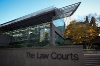 The Law Courts building, which is home to B.C. Supreme Court and the Court of Appeal, is seen in Vancouver, on Thursday, Nov. 23, 2023. A Crown lawyer says delays to the trial of a man found guilty of murdering a 13-year-old Burnaby, B.C., girl were mostly attributable to the defence and "discrete exceptional events," in his arguments against the case being thrown out on the basis of the holdups. THE CANADIAN PRESS/Darryl Dyck