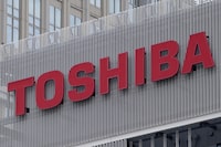 FILE - The logo of Toshiba Corp. is seen at a company's building in Kawasaki near Tokyo, on Feb. 19, 2022. Toshiba announced a 2 trillion yen ($14 billion) tender offer on Monday, Aug. 7, 2023, in a move that will take it private, as the scandal-tarnished Japanese electronics and energy giant seeks to turn itself around. (AP Photo/Shuji Kajiyama, File)