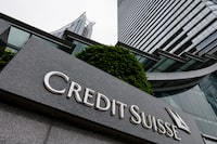 FILE PHOTO: The logo of Credit Suisse bank is seen outside its office building in Hong Kong, China March 20, 2023. REUTERS/Tyrone Siu/File Photo