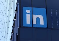 SAN FRANCISCO, CALIFORNIA - JULY 26: A sign is posted on the exterior of a LinkedIn office on July 26, 2023 in San Francisco, California. LinkedIn announced plans to cut nearly 200 jobs at offices in the San Francisco Bay Area. The cuts follow 700 layoffs earlier in the year. (Photo by Justin Sullivan/Getty Images)