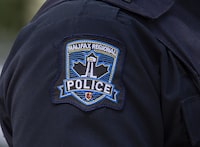 Halifax Regional Police say a man who was the subject of an emergency alert issued earlier this week has been arrested and now faces charges including assault. A Halifax Regional Police emblem is seen in Halifax on Thursday, July 2, 2020. THE CANADIAN PRESS/Andrew Vaughan