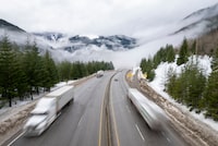 Heavy snowfall and winter storm conditions is wreaking havoc with highways at higher elevations in the Interior of British Columbia. Vehicles drive along the Coquihalla Highway, Wednesday, January 19, 2022. THE CANADIAN PRESS/Jonathan Hayward