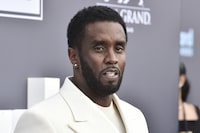 FILE - Music mogul and entrepreneur Sean "Diddy" Combs arrives at the Billboard Music Awards, May 15, 2022, in Las Vegas. A woman sued the hip-hop mogul on Wednesday, Dec. 6, 2023, claiming he and two other men raped her 20 years ago in a New York City recording studio when she was 17. The woman, whose name wasn’t disclosed in the court filing, is the fourth person to file a lawsuit accusing Combs of sexual assault in recent weeks. (Photo by Jordan Strauss/Invision/AP, File)