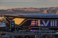 FILE PHOTO: The rising sun illuminates the Allegiant Stadium, where Super Bowl LVIII will take place, in Las Vegas, Nevada, U.S., January 24, 2024. REUTERS/Carlos Barria/File Photo