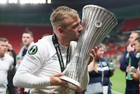 PRAGUE, CZECH REPUBLIC - JUNE 07: Jarrod Bowen of West Ham United kisses the UEFA Europa Conference League trophy after the team's victory during the UEFA Europa Conference League 2022/23 final match between ACF Fiorentina and West Ham United FC at Eden Arena on June 07, 2023 in Prague, Czech Republic. (Photo by Alex Grimm/Getty Images)