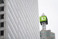 TD Bank signage is pictured in the financial district in Toronto, Friday, Sept. 8, 2023. TD Bank Group says it expects to earn about 30 per cent less from its Charles Schwab Corp. holdings in its results next month than last year, as U.S. banks report earnings.THE CANADIAN PRESS/Andrew Lahodynskyj