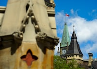 The Peace Tower on Parliament Hill is pictured from the West Gate in Ottawa on Monday, May 6, 2024. THE CANADIAN PRESS/Sean Kilpatrick
