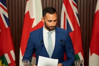 Ontario Education Minister Stephen Lecce speaks to journalists at the Queen's Park Legislature in Toronto, on Friday  August 25, 2023. THE CANADIAN PRESS/Chris Young