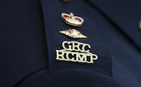 The RCMP in eastern New Brunswick have charged a 16-year-old boy with manslaughter, alleging he struck an 11-year-old boy in the face with a kick scooter almost a year ago in Shippagan. An RCMP logo is seen on the shoulder of an officer during a news conference on Saturday, June 24, 2023, in St. John’s. THE CANADIAN PRESS/Adrian Wyld