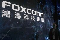 FILE - The Foxconn logo is seen during the Hon Hai Tech Day at the Nangang Exhibition Center in Taipei, Taiwan, on Oct. 18, 2022. Foxconn, a Fortune 500 company known globally for making Apple iPhones, was recently subjected to searches by Chinese tax authorities, state media reported Sunday, Oct. 22, 2023. (AP Photo/Chiang Ying-ying, File)