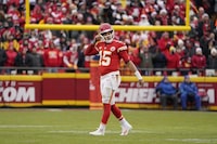 Kansas City Chiefs quarterback Patrick Mahomes heads off the field after turning over the ball on downs during the second half of an NFL football game against the Las Vegas Raiders Monday, Dec. 25, 2023, in Kansas City, Mo. (AP Photo/Ed Zurga)