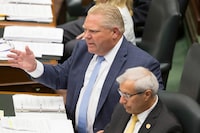 Ontario Premier Doug Ford exchanges words with NDP Leader Andrea Horwath during Question Period at Queen's Park in Toronto on July 31, 2018.