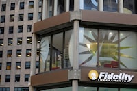 FILE PHOTO: A sign marks a Fidelity Investments office in Boston, Massachusetts, U.S.   REUTERS/Brian Snyder/File Photo
