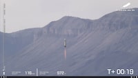 This image provided by Blue Origin shows the New Shepard rocket launching from West Texas on Tuesday, Dec. 19, 2023. Jeff Bezos' space company launched the rocket carrying experiments on Tuesday, its first flight since engine trouble caused a crash more than a year ago. (Blue Origin via AP)