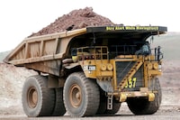 FILE PHOTO: A haul truck carries a full load at a mine operation near Elko, Nevada May 21, 2014.  REUTERS/Rick Wilking/File Photo
