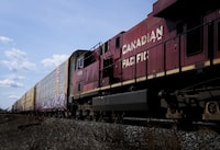 Canadian Pacific Railway trains sit at the main CP Rail train yard in Toronto on Monday, March 21, 2022.
