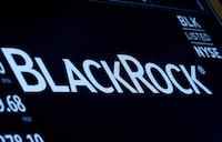 FILE PHOTO: The company logo and trading information for BlackRock is displayed on a screen on the floor of the New York Stock Exchange (NYSE) in New York, U.S., March 30, 2017. REUTERS/Brendan McDermid/File Photo