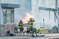 Police say the explosion that destroyed a building in downtown Prince George, B.C., last month was likely caused by "unauthorized" people who broke into the property and were not aware of the natural-gas buildup inside. Prince George fire crews tend to a structure fire caused by an explosion in downtown Prince George, B.C., Tuesday, Aug. 22, 2023. THE CANADIAN PRESS/James Doyle
