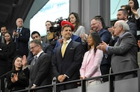 Canadians Michael Kovrig and Michael Spavor stand as they are recognized before President Joe Biden speaks to the Canadian Parliament in Ottawa, Canada, Friday, Mach 24, 2023. (Mandel Ngan/Pool via AP)