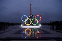 (FILES) A picture shows the Olympics Rings on the Trocadero  Esplanade near the Eiffel Tower in Paris, on September 13, 2017, after the  International Olympic Committee named Paris host city of the 2024 Summer Olympic Games. The Olympic rings will be installed on the Eiffel Tower for the Paris 2024 Olympic Games, it was learned from the site's operator said on April 8, 2024. (Photo by CHRISTOPHE SIMON / AFP) (Photo by CHRISTOPHE SIMON/AFP via Getty Images)