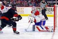 Carolina Hurricanes' Sebastian Aho (20) has his shot go wide of Montreal Canadiens goaltender Sam Montembeault (35) during the second period of an NHL hockey game in Raleigh, N.C., Thursday, March 7, 2024. (AP Photo/Karl B DeBlaker)