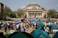 Students protestors gather in protest inside their encampment on the Columbia University campus, Monday, April 29, 2024, in New York. Protesters of the war in Gaza who are encamped at Columbia University have defied a deadline to disband with chants, clapping and drumming. (AP Photo/Stefan Jeremiah)