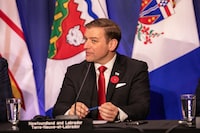 Andrew Furey, premier of Newfoundland and Labrador, looks on during a press conference in Halifax, Monday, Nov. 6, 2023. Newfoundland and Labrador unveiled a poverty reduction plan today that includes a basic income program for residents aged 60-64 who receive social assistance. THE CANADIAN PRESS/Kelly Clark