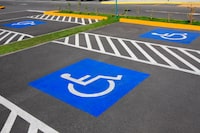 iStockPhoto -- ROYALTY-FREE

Wheelchair parking space -- Handicap parking space. Parking lot inaugurated recently. Universal symbols painted on the asphalt. 07-22-09 © luoman

Parking Lot, Disabled Parking Sign, Road Sign, Wheelchair, Asphalt, Road Signal, New, Law, Parking