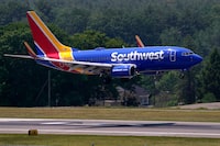 FILE - Southwest Airlines Boeing 737 lands at Manchester Boston Regional Airport, June 2, 2023, in Manchester, N.H.  Southwest Airlines  reports their earnings on Thursday, Jan. 25, 2024. (AP Photo/Charles Krupa, File)