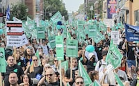 People take part in a public sector union demonstration in Montreal, Saturday, September 23, 2023. The Quebec government is expected to present a contract offer today to public sector unions who are on the cusp of a strike. THE CANADIAN PRESS/Graham Hughes