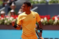 MADRID, SPAIN - APRIL 25: Felix Auger-Aliassime of Canada celebrates winning match point against Yoshihito Nishioka of Japan on Day Two during their 1st Round game of the Mutua Madrid Open at La Caja Magica on April 25, 2024 in Madrid, Spain. (Photo by Clive Brunskill/Getty Images)