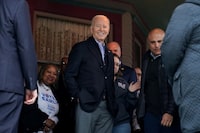 FILE PHOTO: U.S. President Joe Biden meets supporters and volunteers during a campaign event at a home in Saginaw, Michigan, U.S., March 14, 2024.  REUTERS/Kevin Lamarque/File Photo
