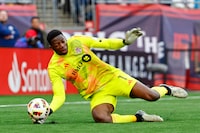 Mar 3, 2024; Foxborough, Massachusetts, USA; Toronto FC goalkeeper Sean Johnson (1) makes a save against the New England Revolution during the second half at Gillette Stadium. Mandatory Credit: Winslow Townson-USA TODAY Sports