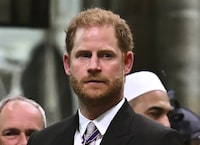 FILE - Britain's Prince Harry, Duke of Sussex looks on as Britain's King Charles III leaves Westminster Abbey after coronation in central London Saturday, May 6, 2023. Prince Harry has spoken to King Charles III about his cancer diagnosis and “will be traveling to the U.K. to see His Majesty in the coming days,” said the office of Harry and his wife, Meghan. (Ben Stansall/Pool photo via AP, File)