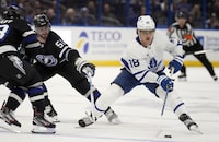 Toronto Maple Leafs right wing William Nylander (88) works around Tampa Bay Lightning left wing Austin Watson (51) and left wing Conor Sheary (73) during the first period of an NHL hockey game Wednesday, April 17, 2024, in Tampa, Fla. THE CANADIAN PRESS/AP-Chris O'Meara