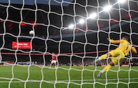 LONDON, ENGLAND - APRIL 23: Victor Lindelof of Manchester United scores their side's seventh and decisive penalty in the penalty shoot out past Robert Sanchez of Brighton & Hove Albion during the Emirates FA Cup Semi Final match between Brighton & Hove Albion and Manchester United at Wembley Stadium on April 23, 2023 in London, England. (Photo by Mike Hewitt/Getty Images)