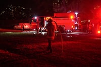 Cities across Canada are reporting a spike in fires in tents and homeless encampments as temperatures drop. Toronto Fire Service attend the scene of an encampment fire in Toronto, on Tuesday, Nov. 28, 2023. THE CANADIAN PRESS/Chris Young