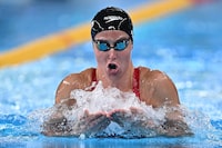 Canada's Sydney Pickrem competes in a semi-final of the women's 200m breaststroke swimming event during the 2024 World Aquatics Championships at Aspire Dome in Doha on February 15, 2024. (Photo by MANAN VATSYAYANA / AFP) (Photo by MANAN VATSYAYANA/AFP via Getty Images)