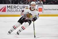 Apr 18, 2024; Los Angeles, California, USA; Chicago Blackhawks center Connor Bedard (98) in action against the Los Angeles Kings during the third period at Crypto.com Arena. Mandatory Credit: Gary A. Vasquez-USA TODAY Sports